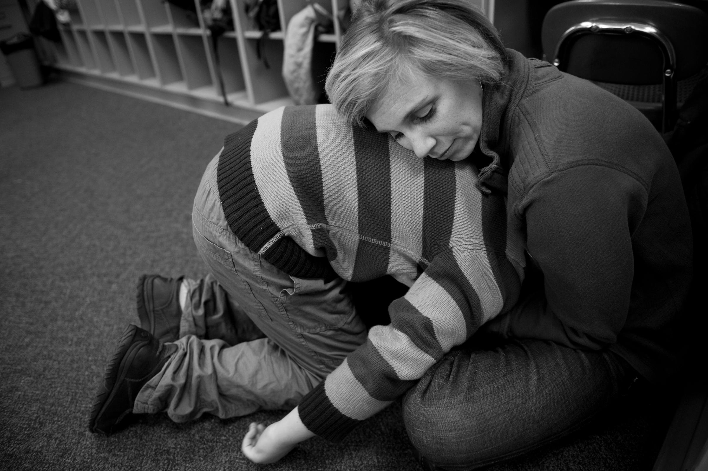 Erin and Marcus share a moment at school before she leaves his classroom at Middle Creek Elementary in Apex, N.C. He always gets upset when she leaves him in the morning.