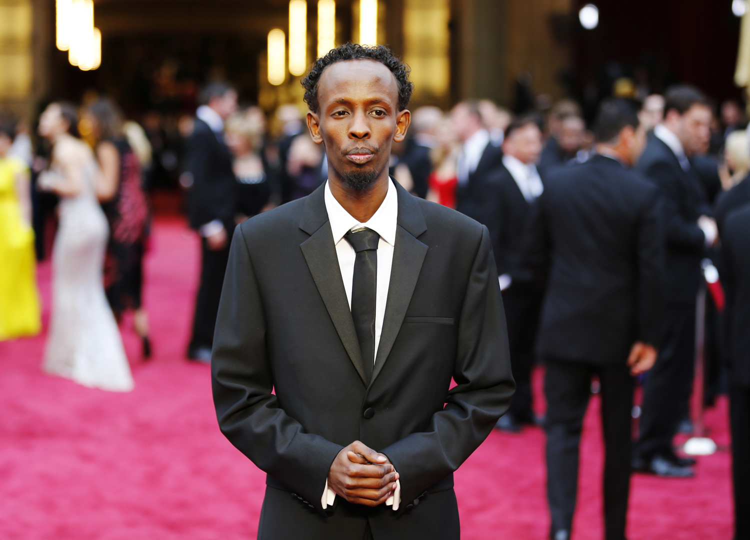 Abdi, best supporting actor nominee for his role in "Captain Phillips", arrives at the 86th Academy Awards in Hollywood