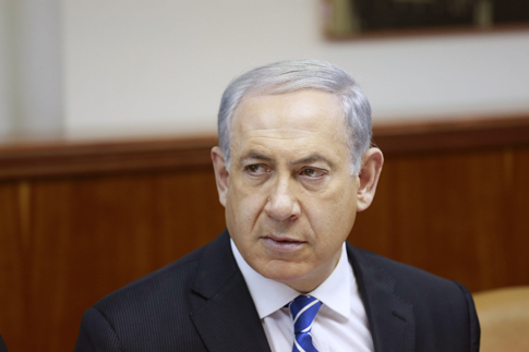Israeli Prime Minister Benjamin Netanyahu chairs the weekly cabinet meeting at his office in Jerusalem, on Jan. 12, 2014.