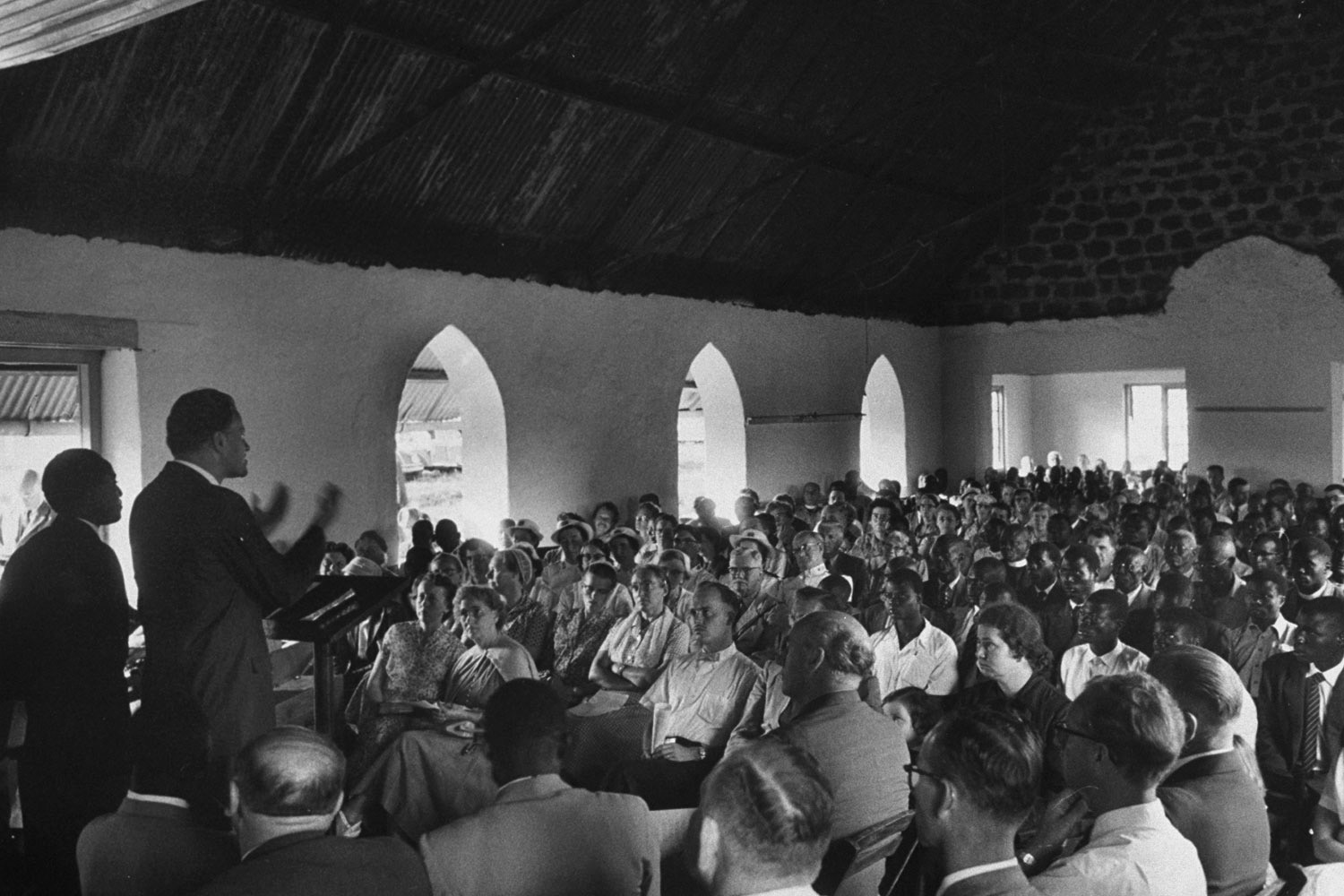 Graham addresses African religious leaders and Salvation Army members in Zimbabwe. He consistently refused to visit South Africa under Apartheid until its government finally allowed desegregated audiences.