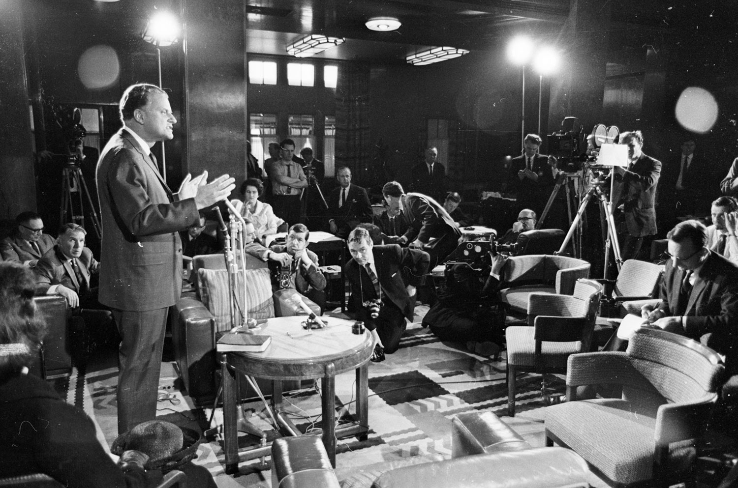 After his arrival in Southampton, England on another global set of Crusades, Graham speaks to reporters, May 24, 1966.