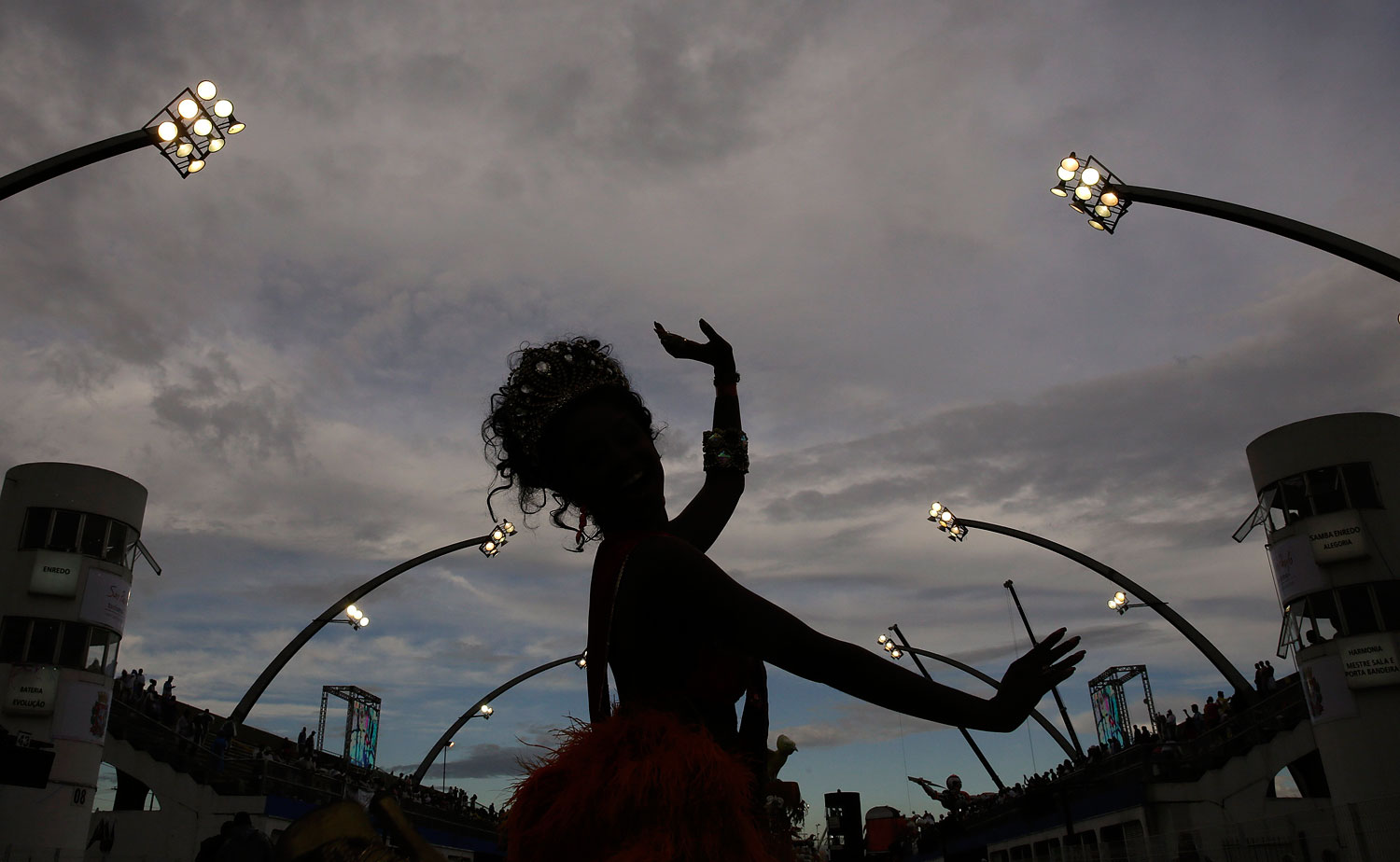 A dancer from the Tom Maior samba school performs during a carnival parade in Sao Paulo, Brazil, Saturday, March 1, 2014.