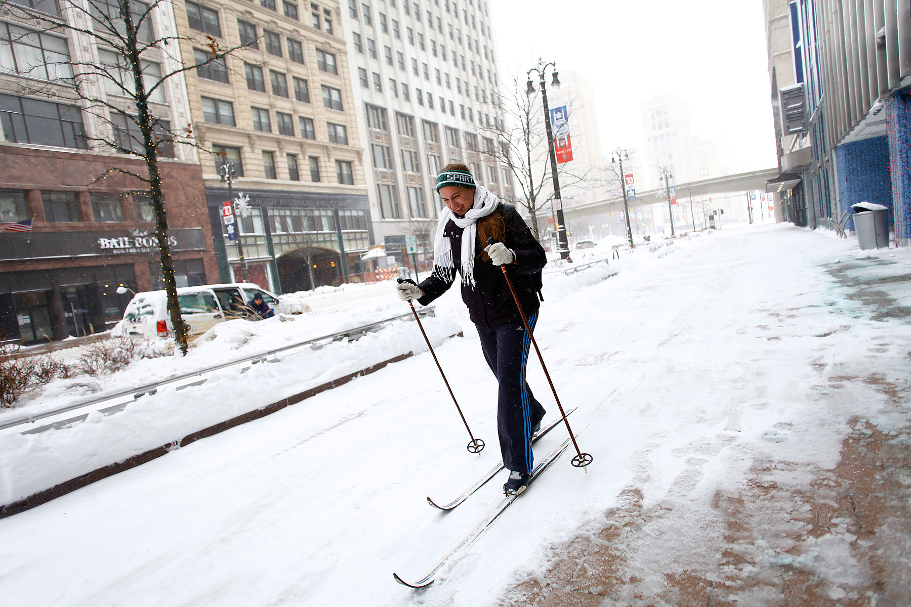 Alison Mueller skies to work through several inches of snow along Woodward Avenue as the area deals with record breaking freezing weather January 6, 2014 in Detroit, Michigan. (Joshua Lott&mdash;Getty Images)