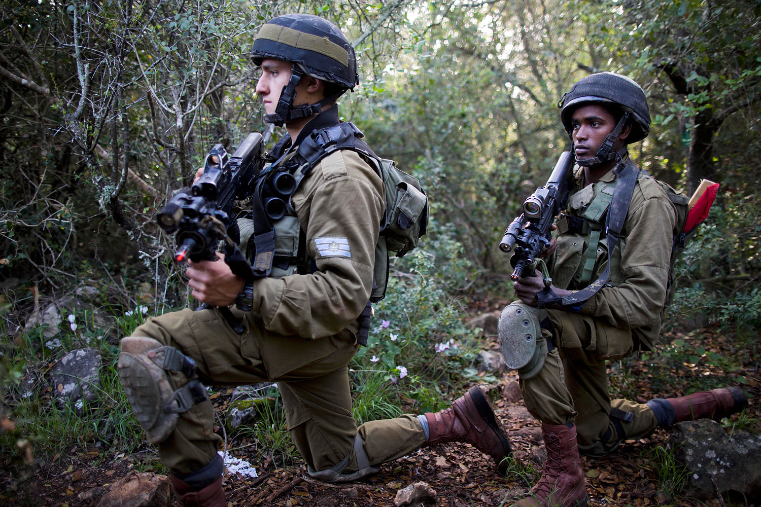 Israeli Defense Forces (IDF) soldiers are seen during warfare training in Israel's northern El Yakim base, Feb. 27, 2014. (Abir Sultan—EPA)
