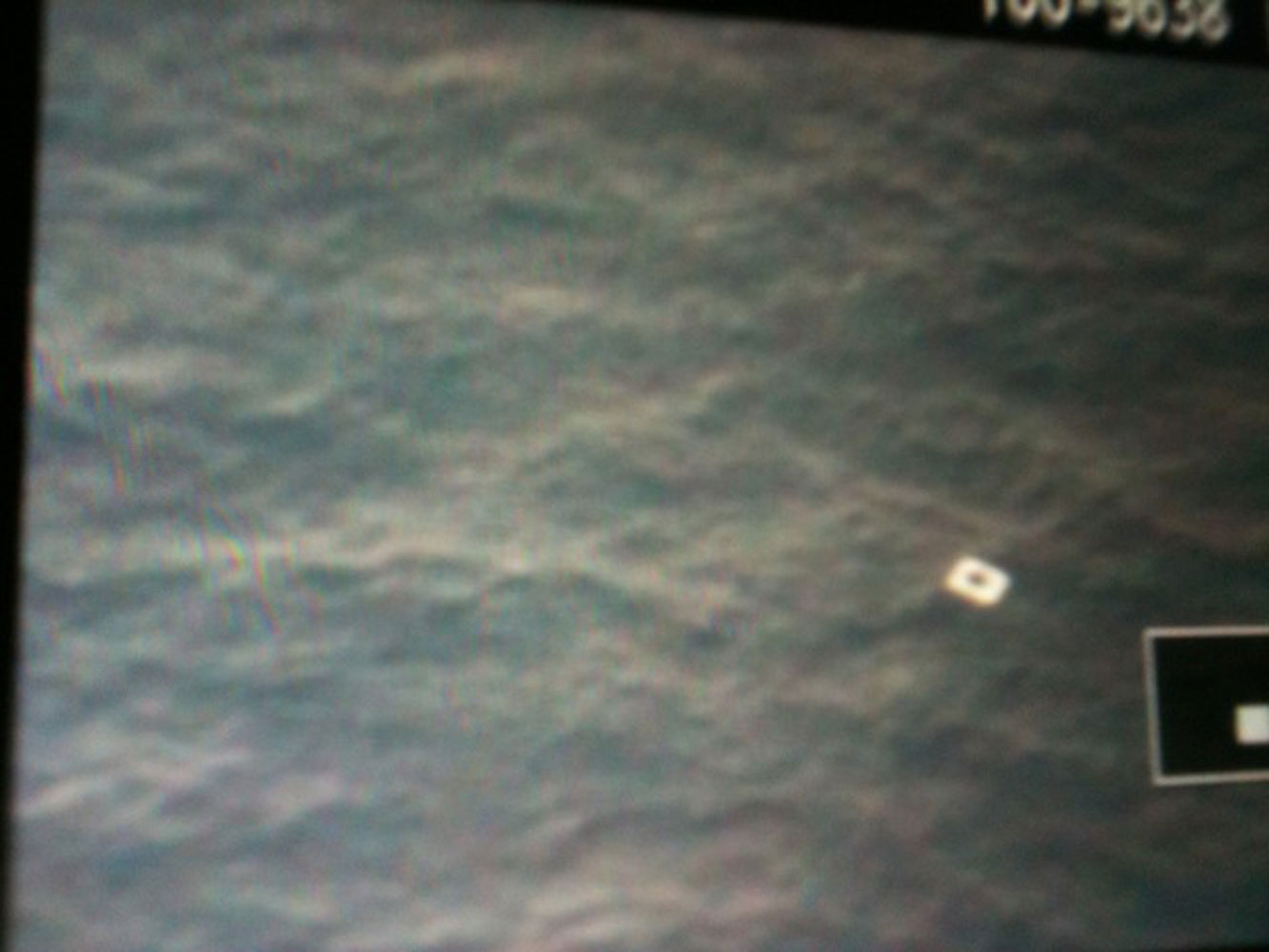 A picture taken by personnel of a Vietnamese search aircraft and made available by Tienphong.vn on March 9, 2014, shows what is believed to be a piece of debris of the missing Malaysia Airlines airplane (Tienphong.vnt—EPA)