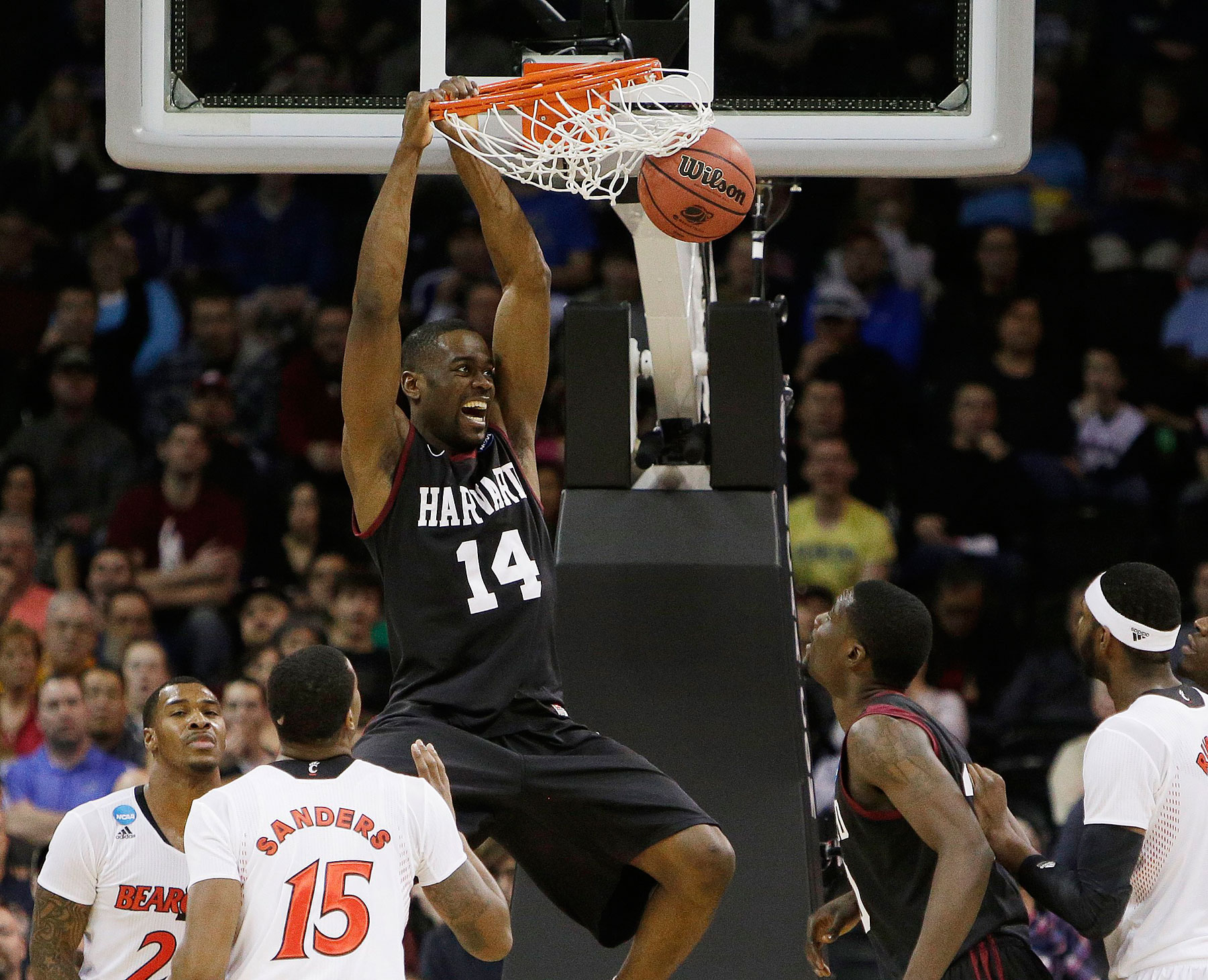 Harvardís Steve Moundou-Missi dunks against Cincinnati in the second half during the second-round of the NCAA men's college basketball tournament in Spokane, Wash., March 20, 2014. (Young Kwak&mdash;AP)