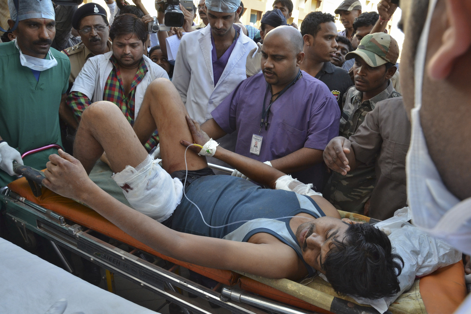 An injured Indian CRPF personnel is taken to a hospital at Raipur