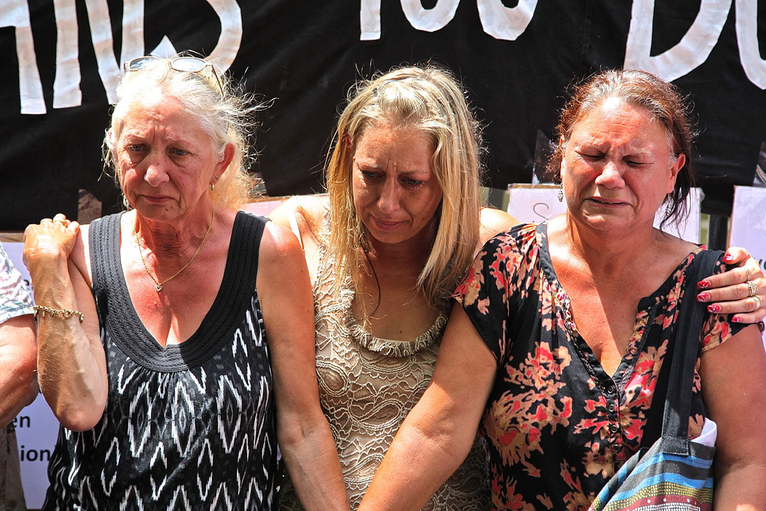 Members of Grandmothers Against Removals protesting against the overrepresentation of indigenous children in the child-protection system on the steps of the parliament house of New South Wales in Sydney on Feb. 13, 2014 (Ian Lloyd Neubauer)