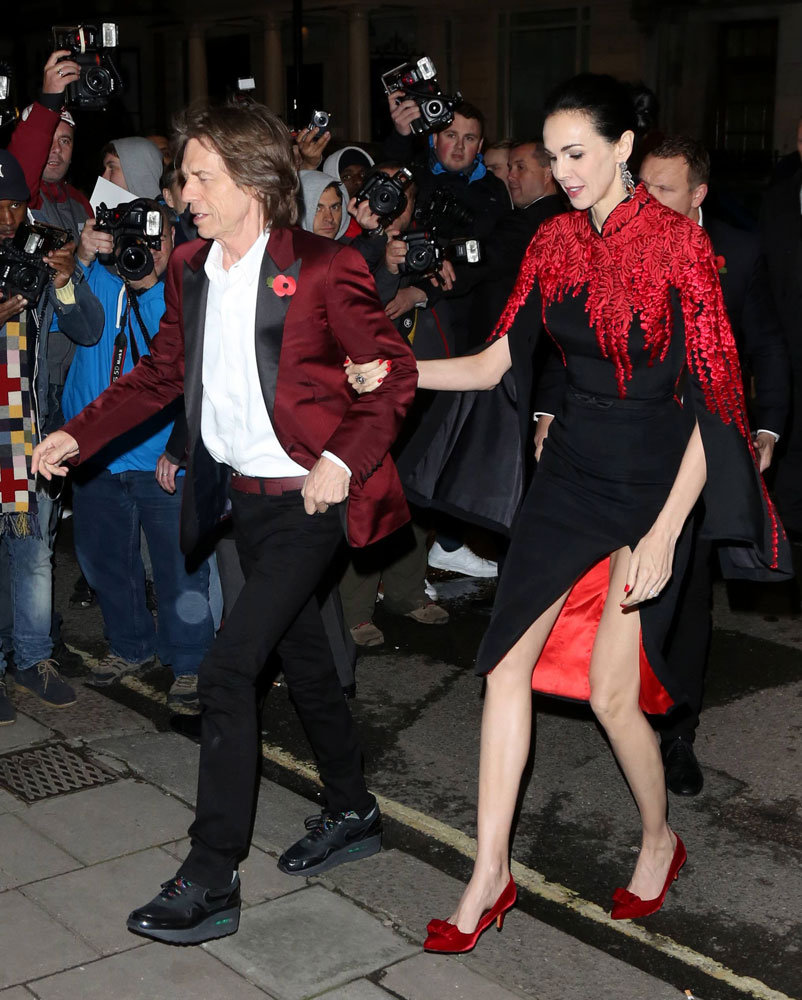 From left: Mick Jagger and L'Wren Scott at the Harper's Bazaar Women of the Year Awards 2013 at Claridges, in London on May 11, 2013.