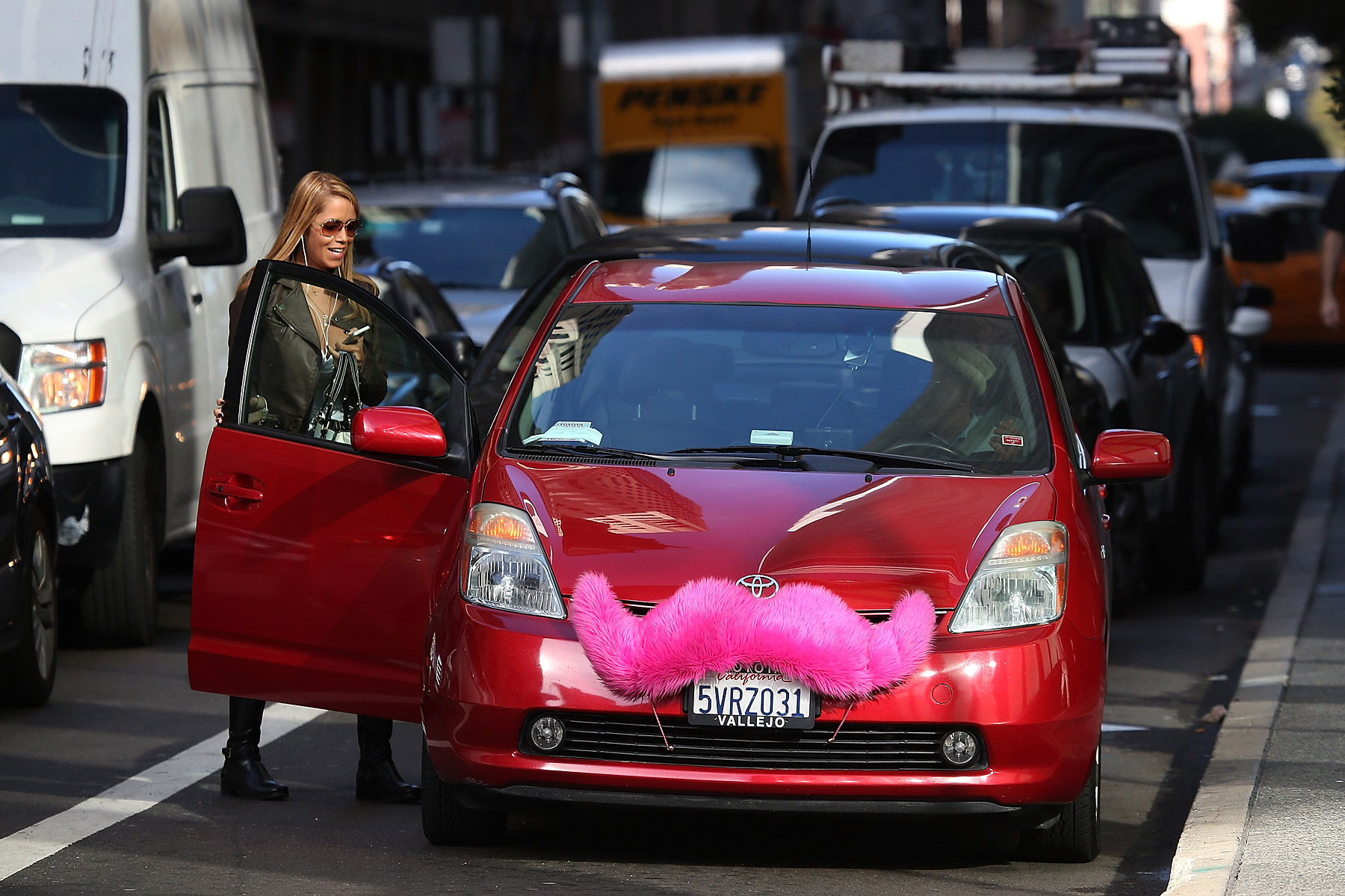 A Lyft customer gets into a car on January 21, 2014 in San Francisco, California. (Justin Sullivan&mdash;Getty Images)