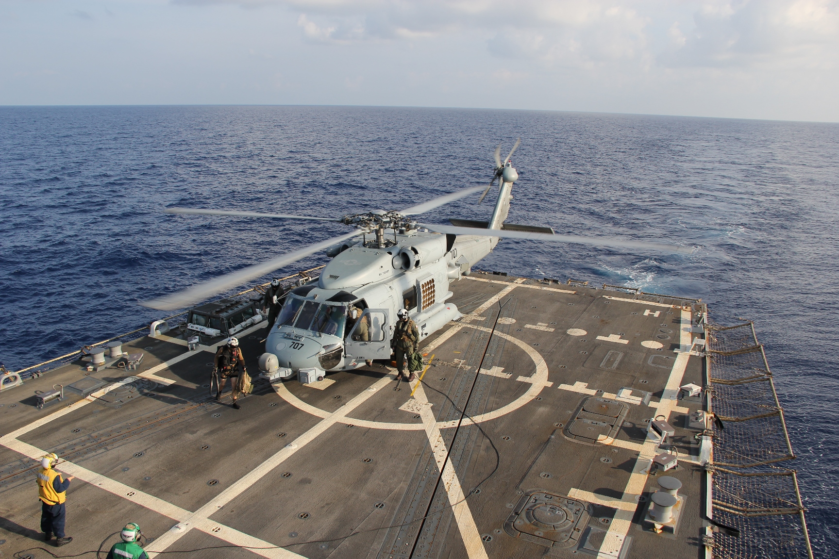 A U.S. Navy MH-60R Sea Hawk helicopter preparing to return to the search and rescue for the missing Malaysian airlines flight MH370 on March 9, 2014 at sea in the Gulf of Thailand. (U.S. Navy — Getty Images)