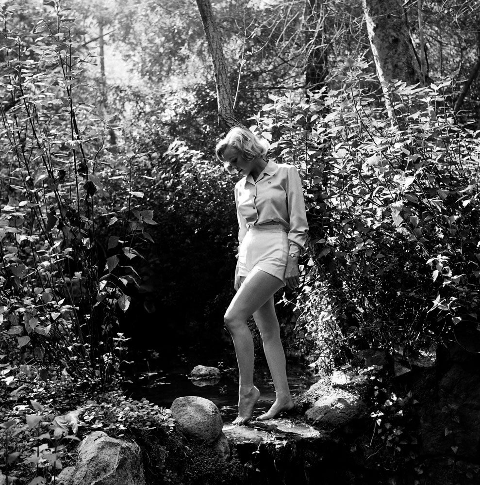 A rare (undated) photo of Monroe lounging in Griffith Park in Los Angeles.
