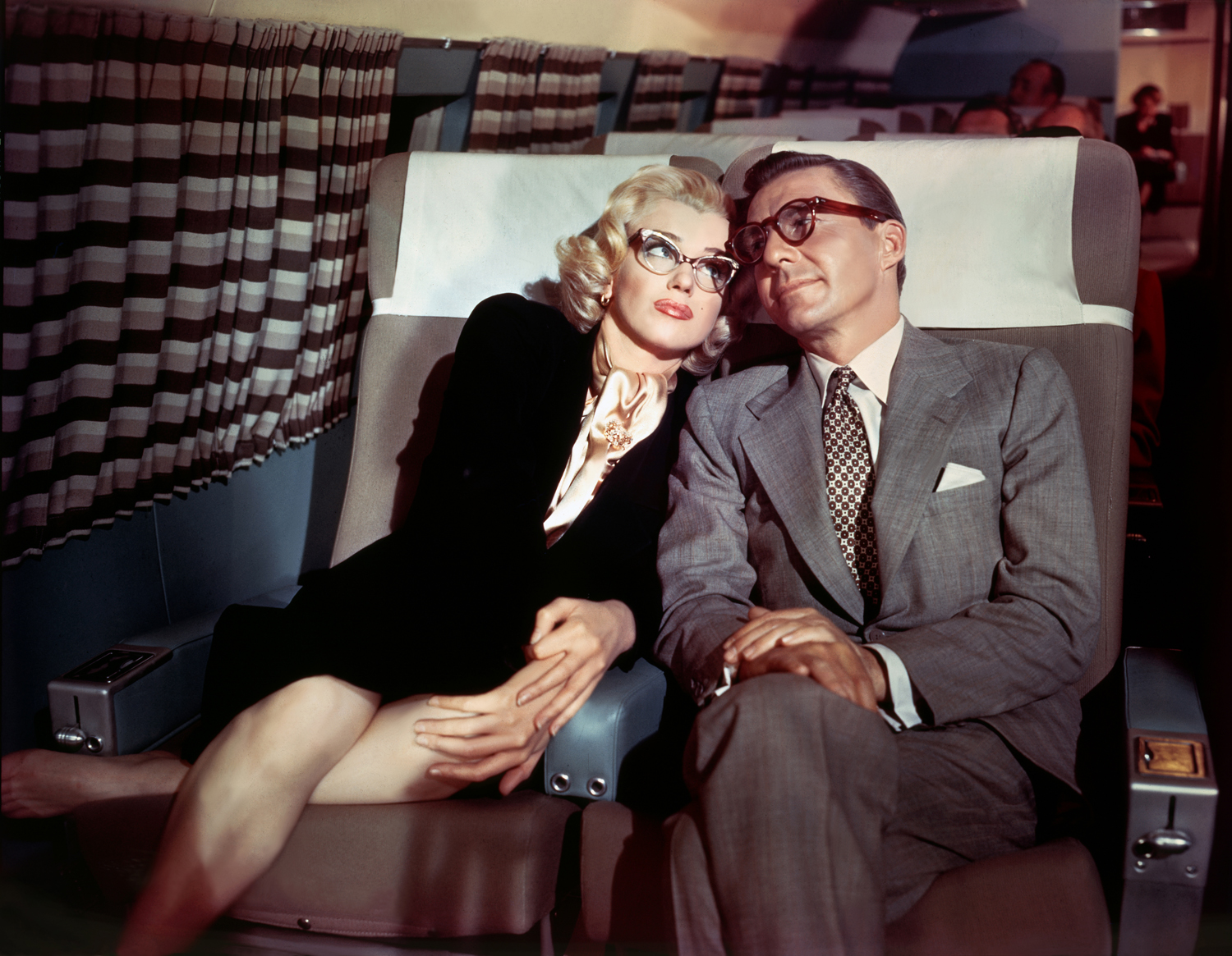 In the early 1950s, Monroe mugs on the set of How to Marry a Millionaire with fellow actor David Wayne.
