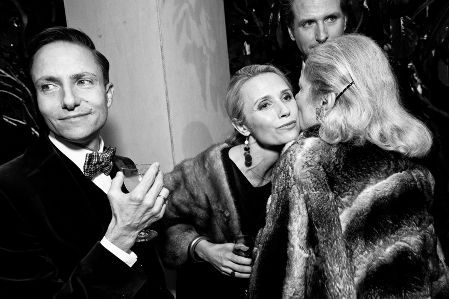 Documentary filmmaker Jennifer Siebel Newsom leans in to greet Denise Hale while attending Getty Oil heir Gordon Getty’s 80th birthday party with her husband California Lieutenant Governor Gavin Newsom (right) and interior designer Ken Fulk (left). The Getty’s threw the lavish party at their home and invited an estimated 600 guests to the festivities. From the series The Social Stage, 2013CREDIT: Laura Morton