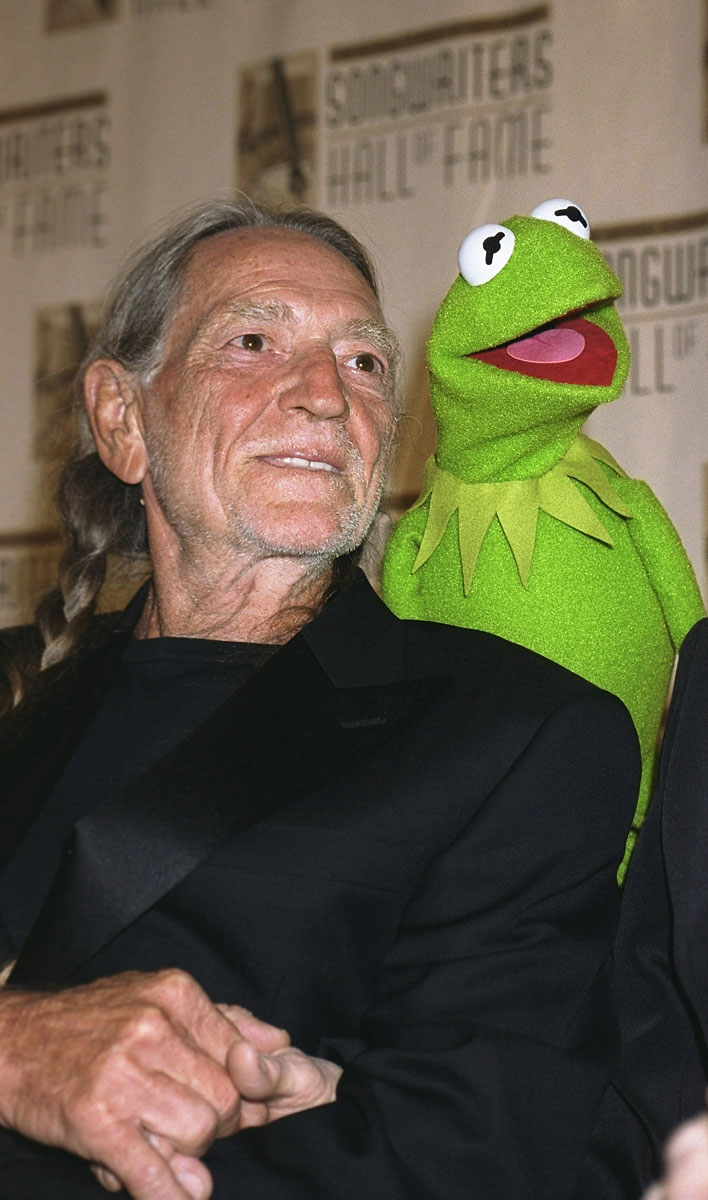 Willie Nelson is serenaded by Kermit the Frog at the Songwriters Hall of Fame's annual induction ceremonies.