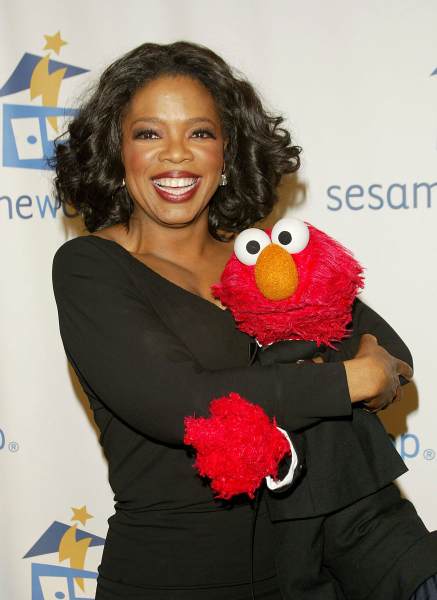 Oprah and Elmo attend the Sesame Workshop's Second Annual Benefit Gala on June 2, 2004 in New York City.