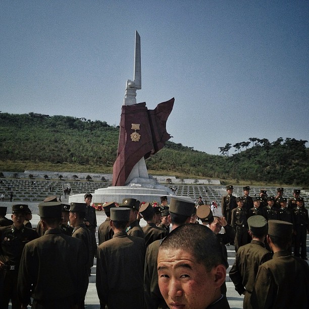 North Korean soldiers gather at a cemetery for military veterans near Pyongyang as they observe Chuseok, Korea's traditional Thanksgiving holiday, September 19, 2013.