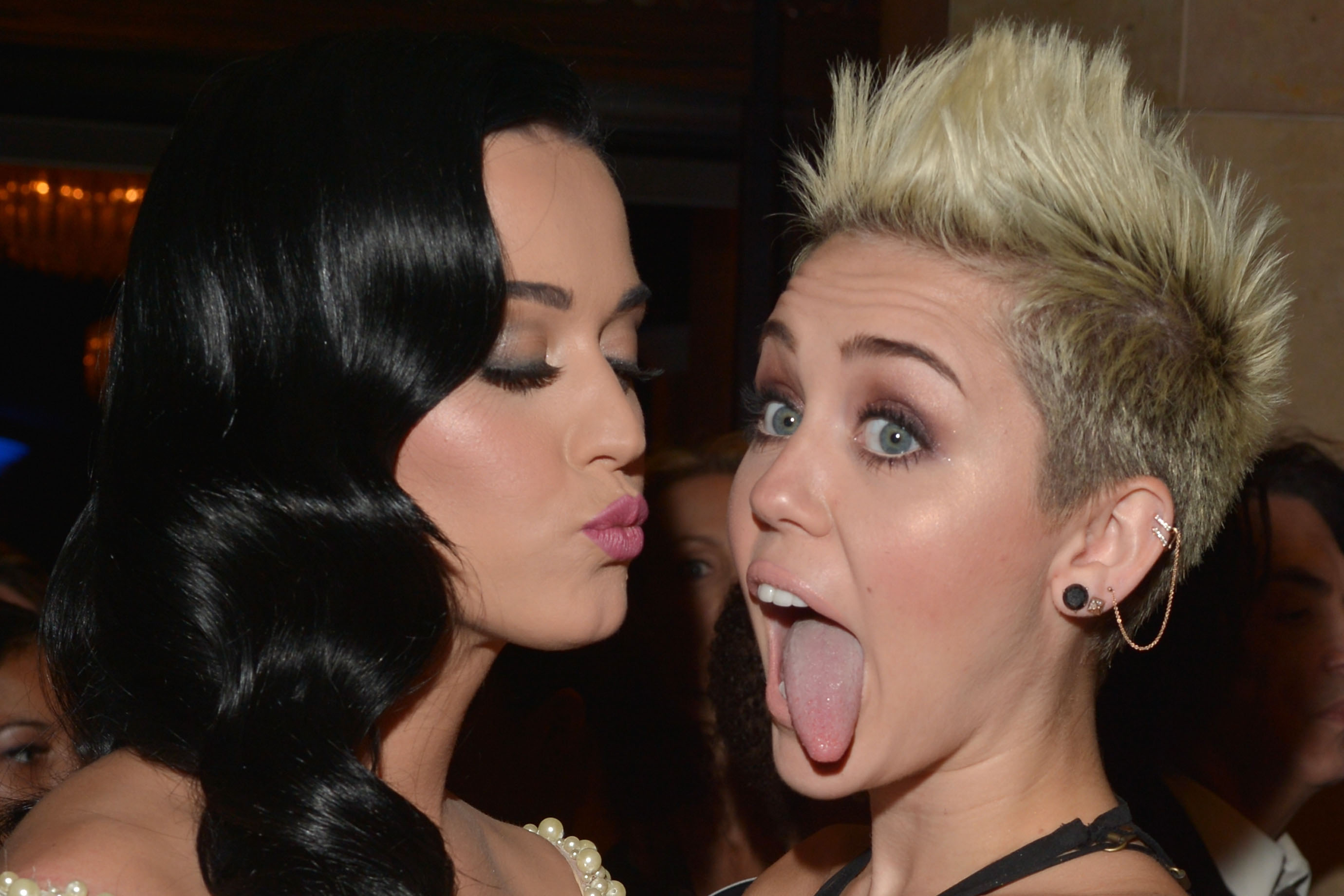 Perry didn't seem to mind Cyrus' tongue too much at the 2013 Grammy's (Lester Cohen&mdash;WireImage)