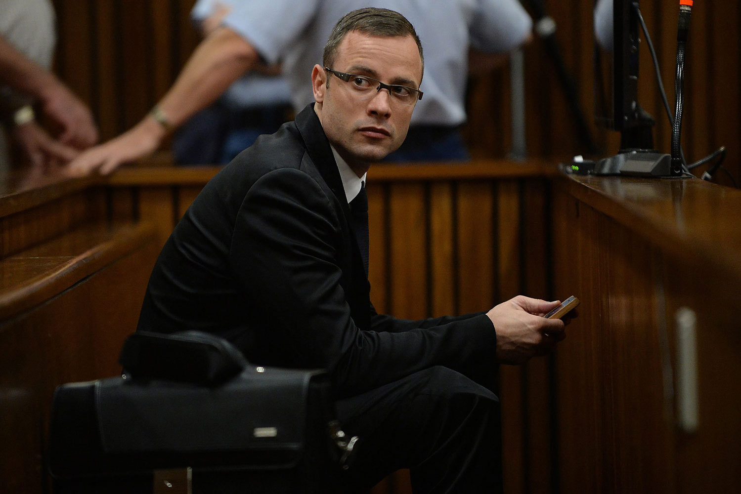 South African Paralympic athlete Oscar Pistorius is seen during his ongoing murder trial at the high court in Pretoria, South Africa, March 14, 2014. 