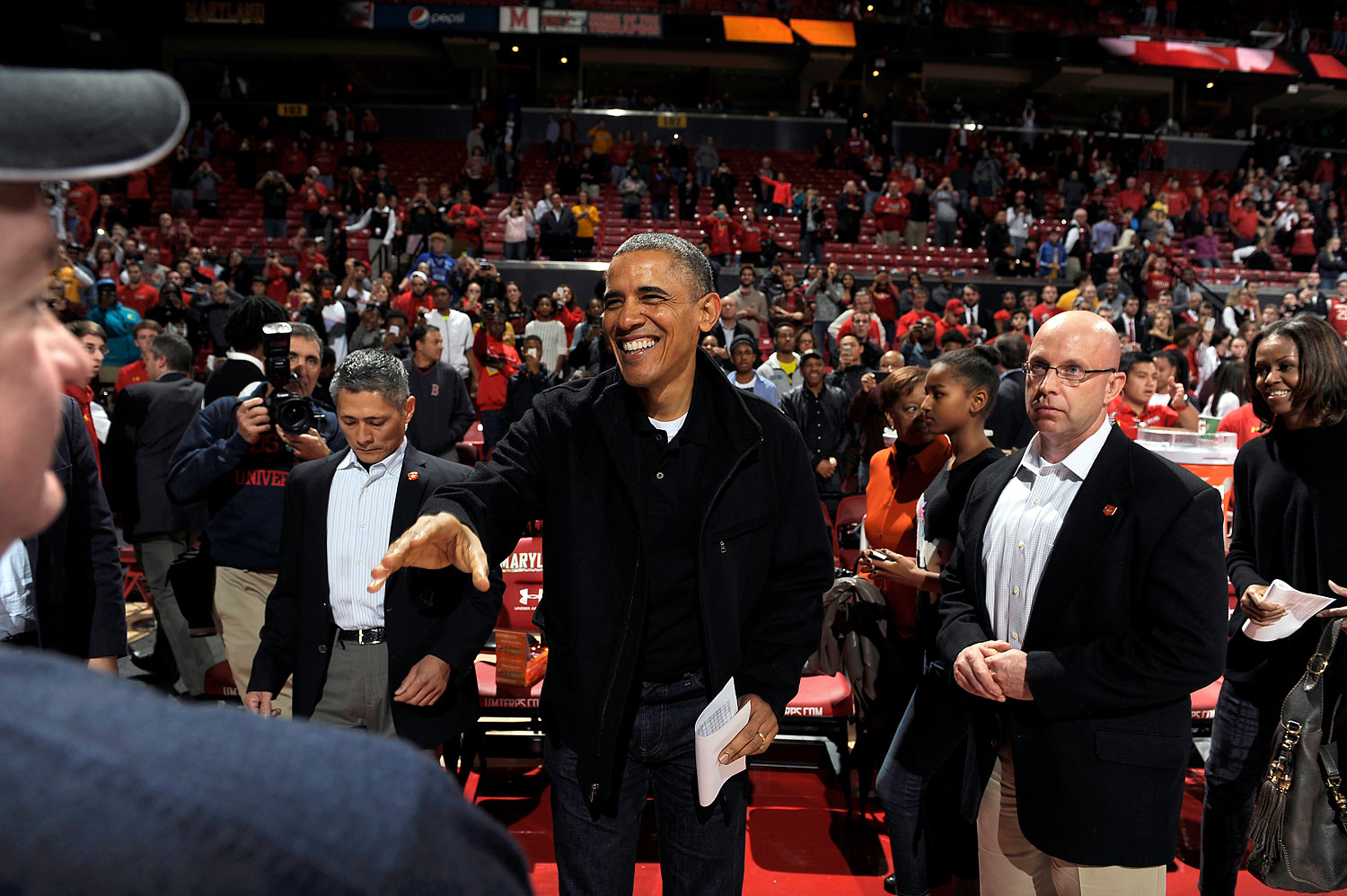 President Obama at a college basketball game between the Oregon State Beavers and the Maryland Terrapins at the Comcast Center on Nov. 17, 2013 in College Park, Maryland.