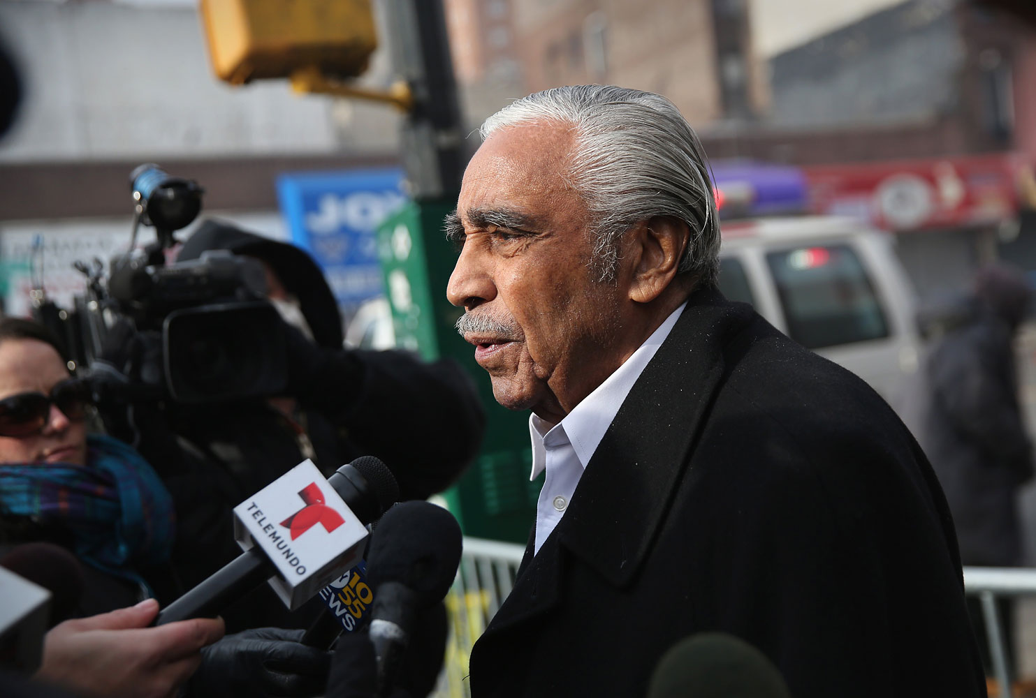 U.S. Rep. Charles Rangel (D-NY), speaks to the media near the smoking site of an explosion in East Harlem on March 13, 2014 in New York City.