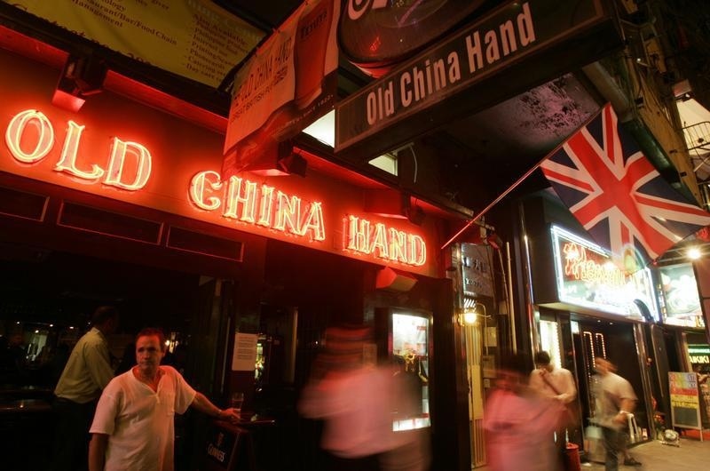 Expatriate men have been targeted by female thieves in bars in the Wan Chai district of Hong Kong (Bobby Yip—Reuters)