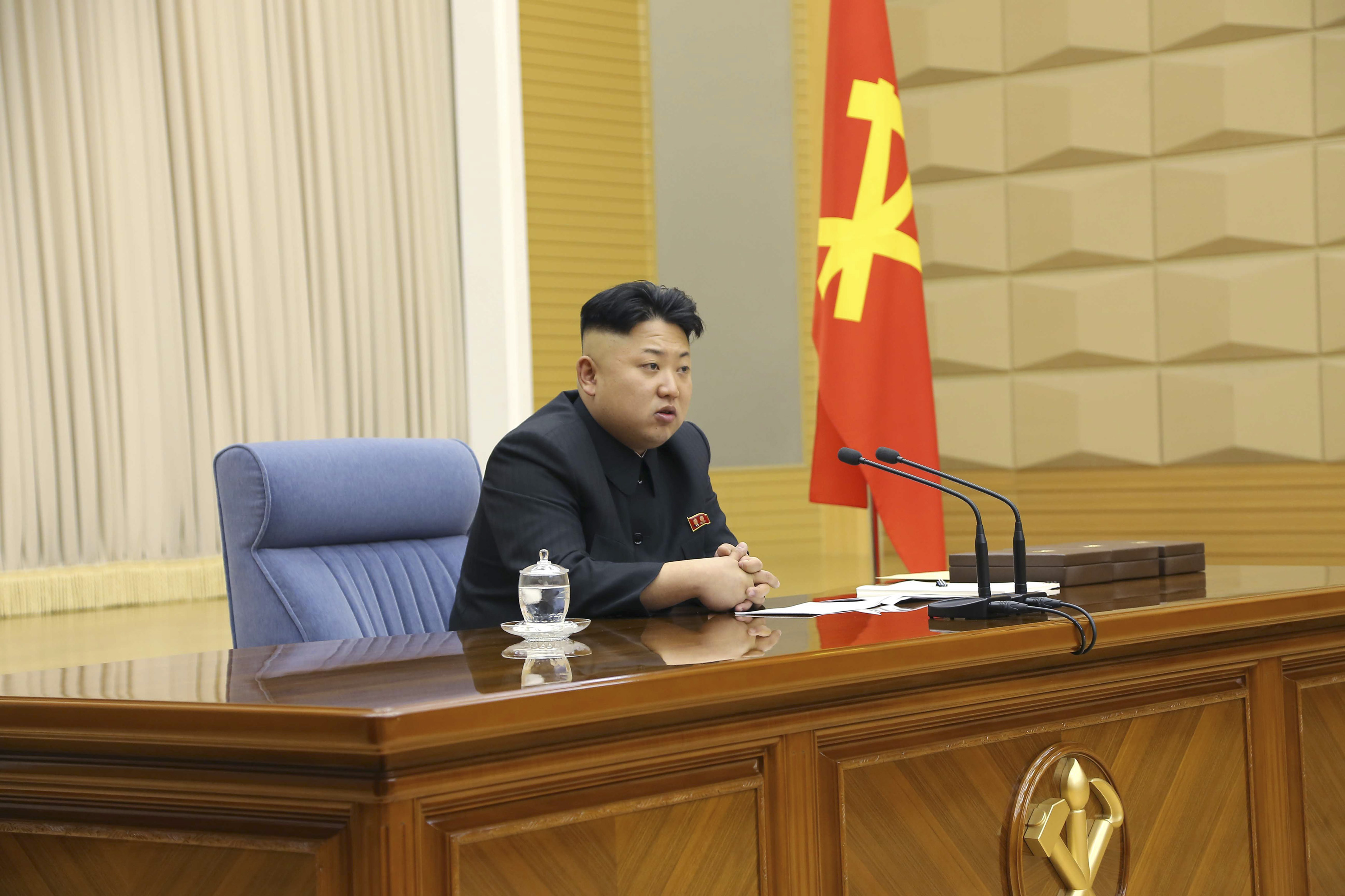 Nice haircut, Mr Dictator. North Korea leader Kim Jong Un presides over a meeting of the Central Military Commission of the Workers' Party of Korea. (KCNA / Reuters)