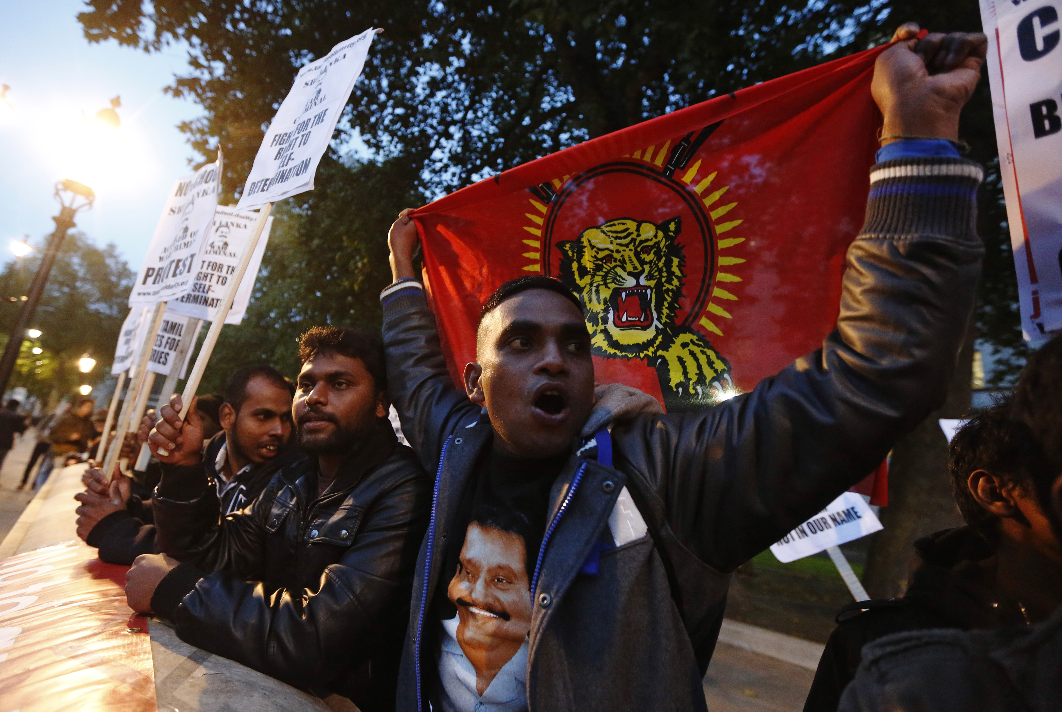 Tamil demonstratorsprotest Sri Lanka's human rights record outside Downing Street in  London in November  2013. (© Luke MacGregor / Reuters&mdash;REUTERS)