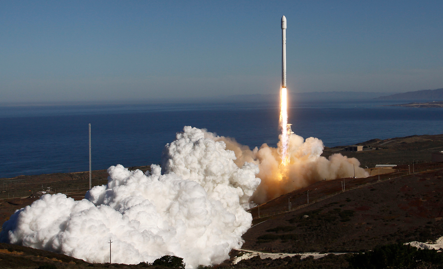A Falcon 9 rocket carrying a small science satellite for Canada is launched from a newly refurbished launch pad in Vandenberg Air Force Station in California, on Sept. 29, 2013.