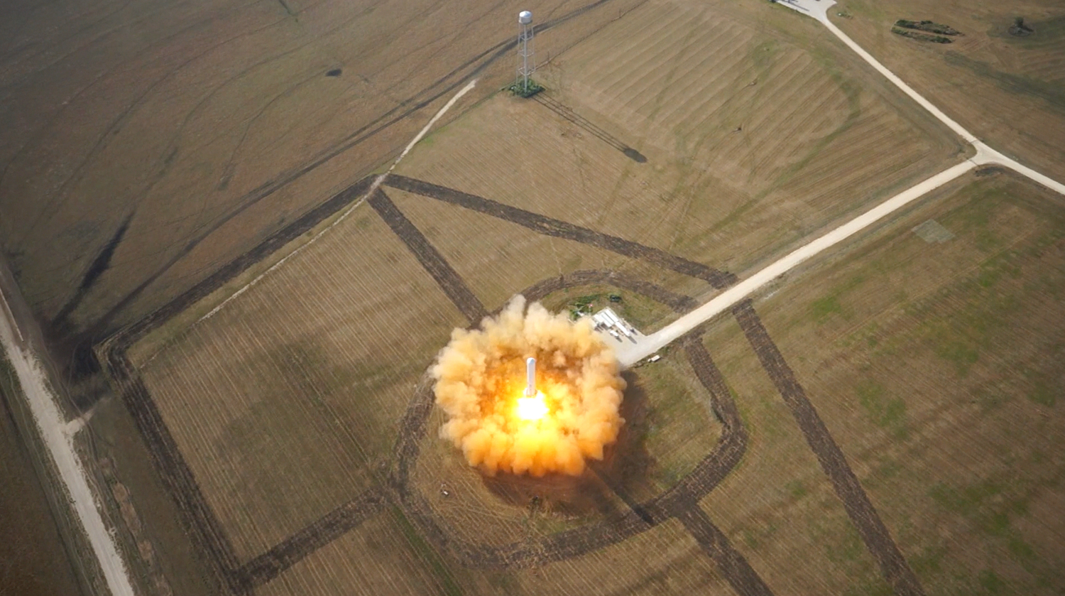 SpaceX's reusable rocket prototype, Grasshopper, completes a 325 meter hop on June 14, 2013 before smoothly landing back on the pad.