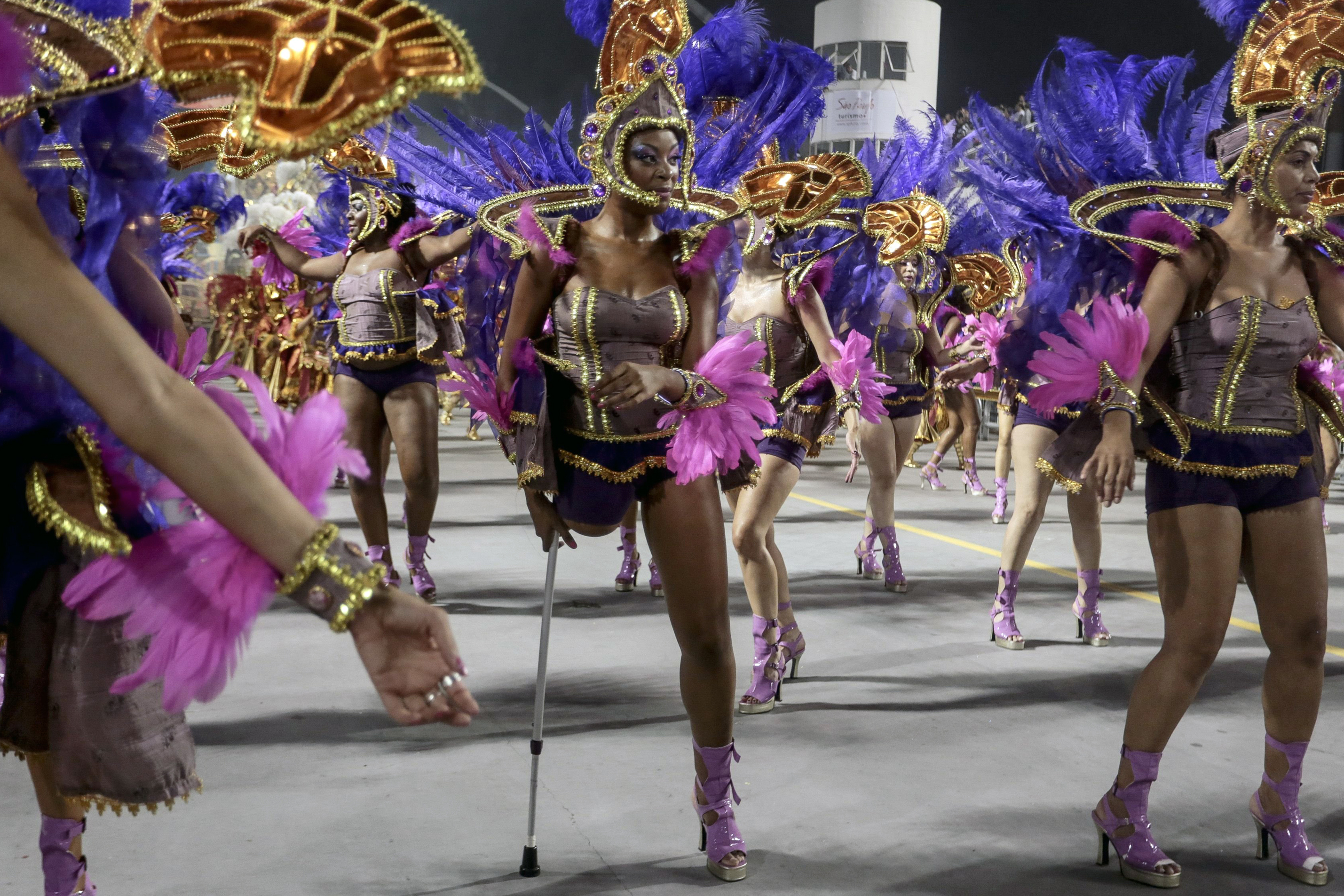 Revelers of the Nene de Vila Matilde samba school perform during the second night of the carnival parade in Sao Paulo on March 1, 2014.