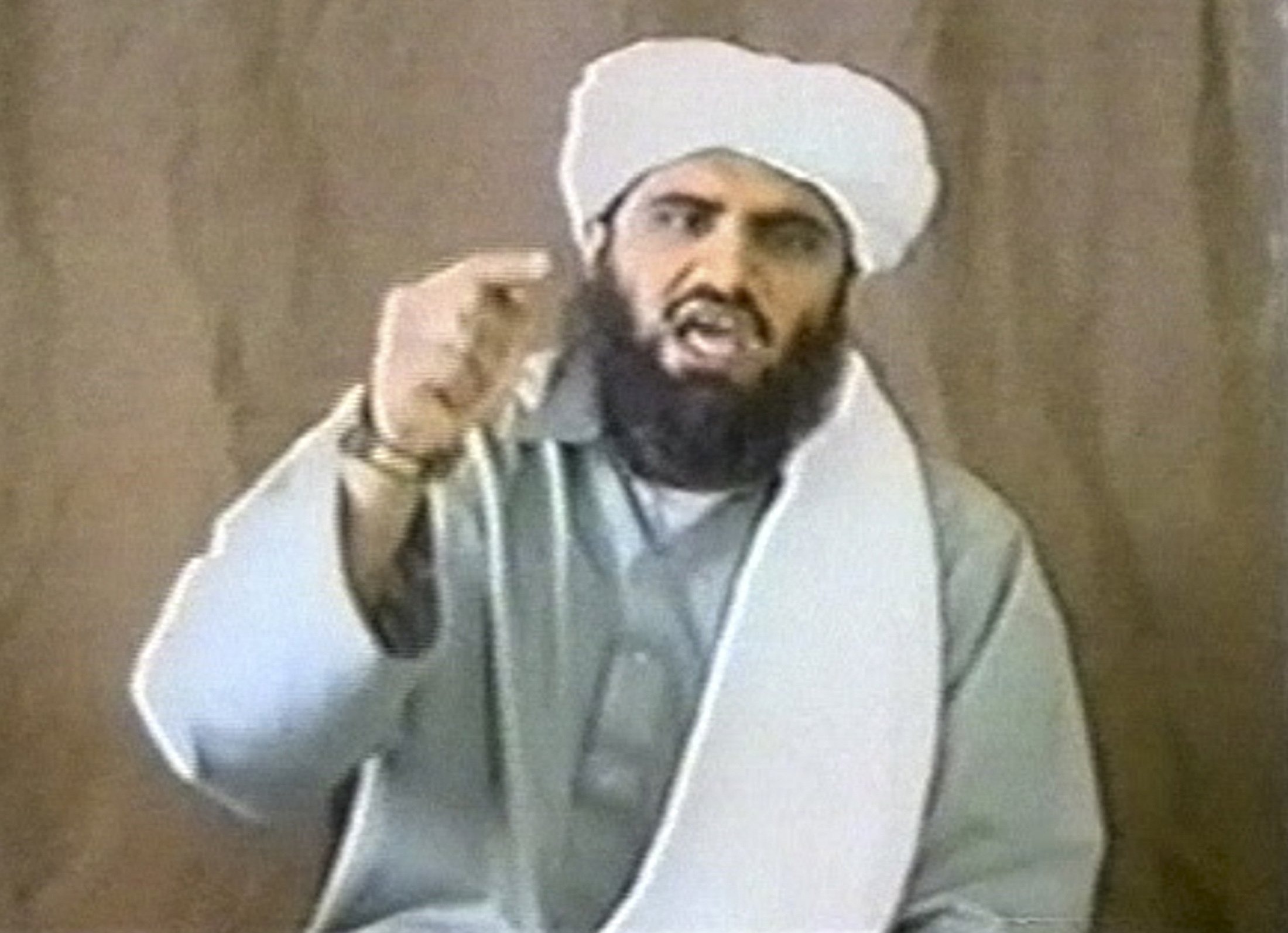 A man identified as Sulaiman Abu Ghaith appears in this still image taken from an undated video address. (Reuters)