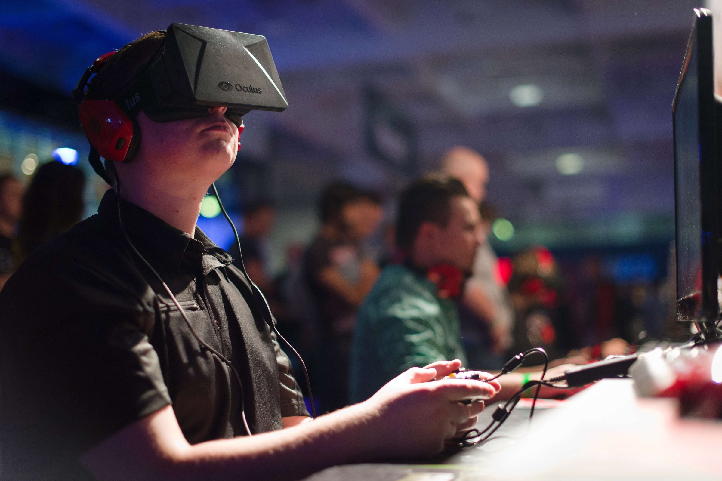 A gamer uses an Oculus virtual reality headset at the Eurogamer Expo 2013 in London.
