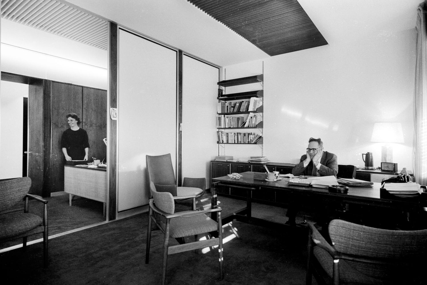 Let's travel back to the 1960s—a time when everything was in grayscale—and breathe in a bit of the decadent air suffusing Don Draper's work life. Looks like that fellow on the right needs a break—so let's stretch our legs and take a stroll around the office with him.