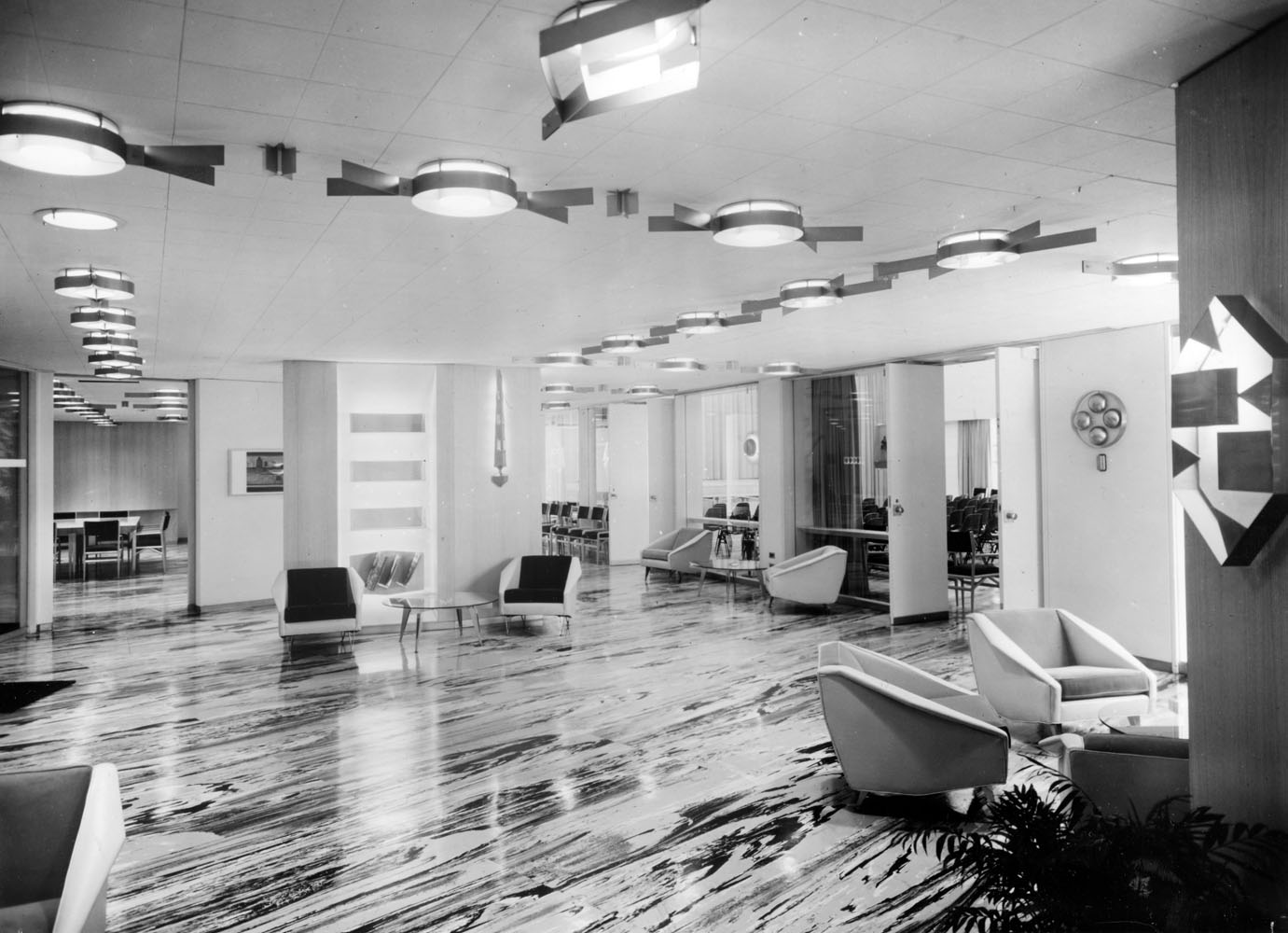 On to the next meeting— but let's take a moment to gaze at this gleaming space-age lobby ...
