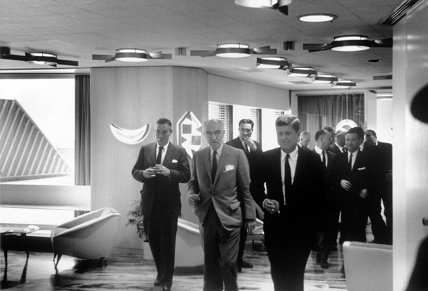 Yep, bumping shoulders with soon-to-be presidents ("Oh, hey there, JFK!") roaming the halls of the building. Just another day at work.