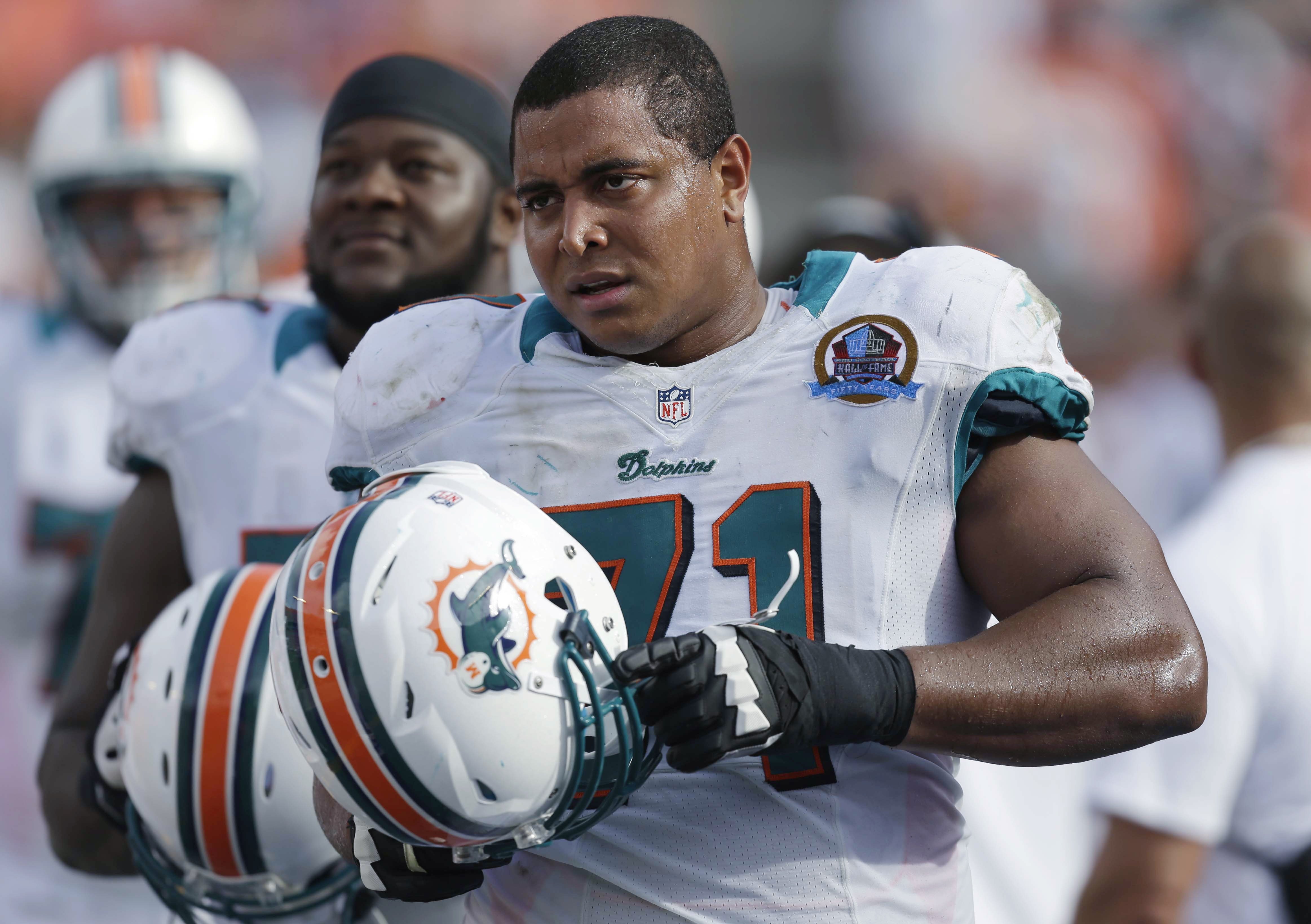 Miami Dolphins tackle Jonathan Martin stands on the sidelines during a Dolphins game in Miami, Dc. 16, 2012. (Wilfredo Lee&mdash;AP)