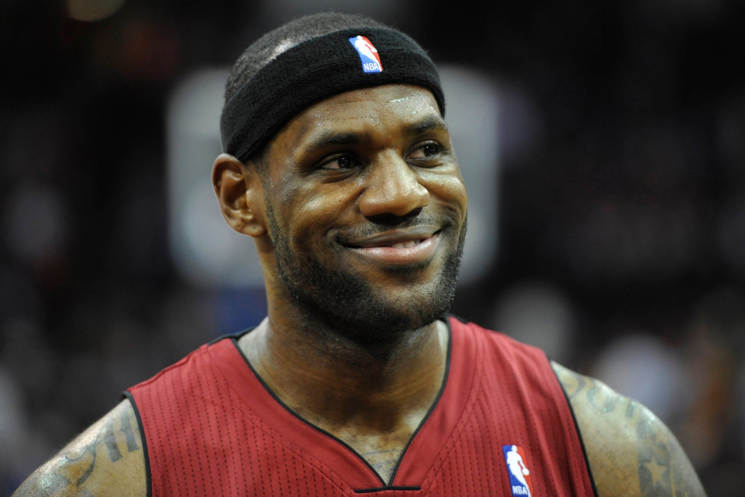Miami Heat forward LeBron James smiles after a 100-96 win over the Cleveland Cavaliers at Quicken Loans Arena