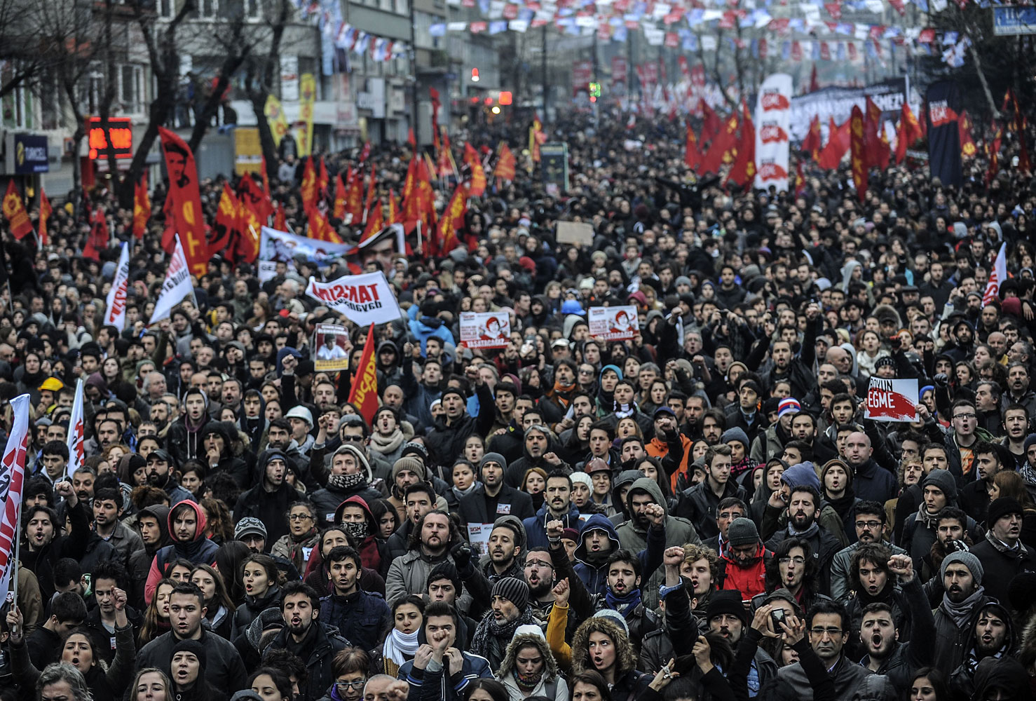 People gather for the funeral of Berkin Elvan, the 15-year-old boy who died from injuries suffered during last year's anti-government protests, in Istanbul on March 12, 2014.