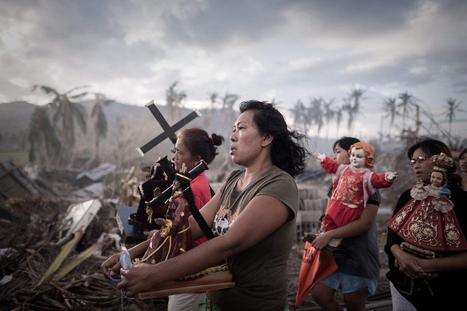Survivors of Typhoon Haiyan march during a religious procession in Tolosa on the eastern Philippine island of Leyte on November 18, 2013.