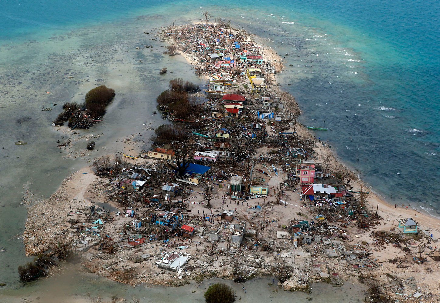 An aerial view of a coastal town, devastated by super Typhoon Haiyan, in Samar province in central Philippines, November 11, 2013.