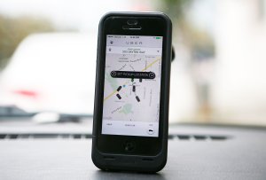 An Uber app is seen on an iPhone in Beverly Hills, California, December 19, 2013.