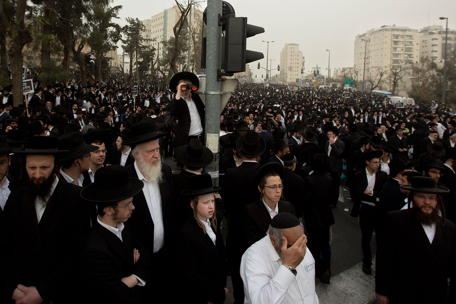 Ultra-Orthodox Jewish men participate in a rally in Jerusalem, March 2, 2014.