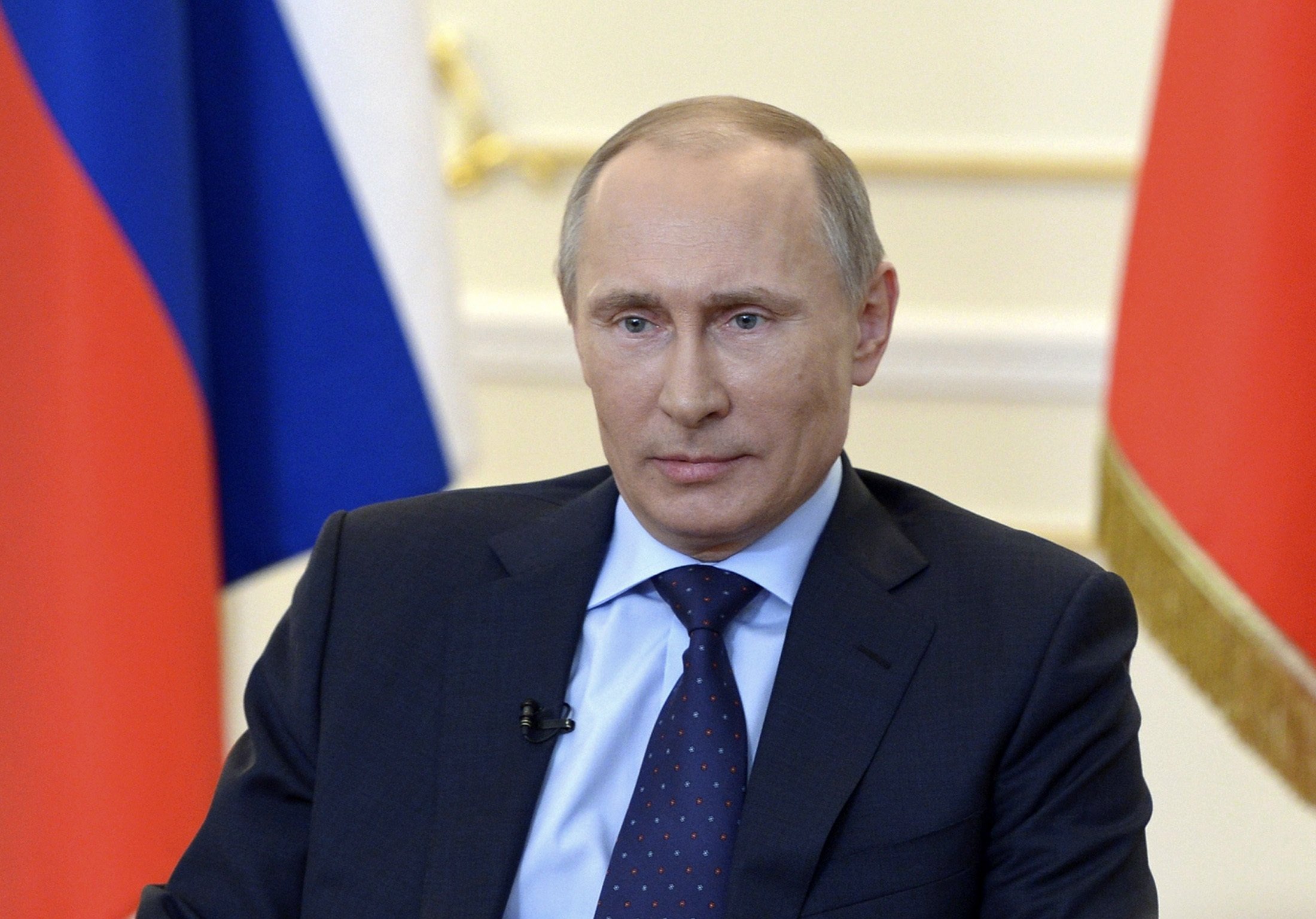 Russian President Putin takes part in a news conference at the Novo-Ogaryovo state residence outside Moscow