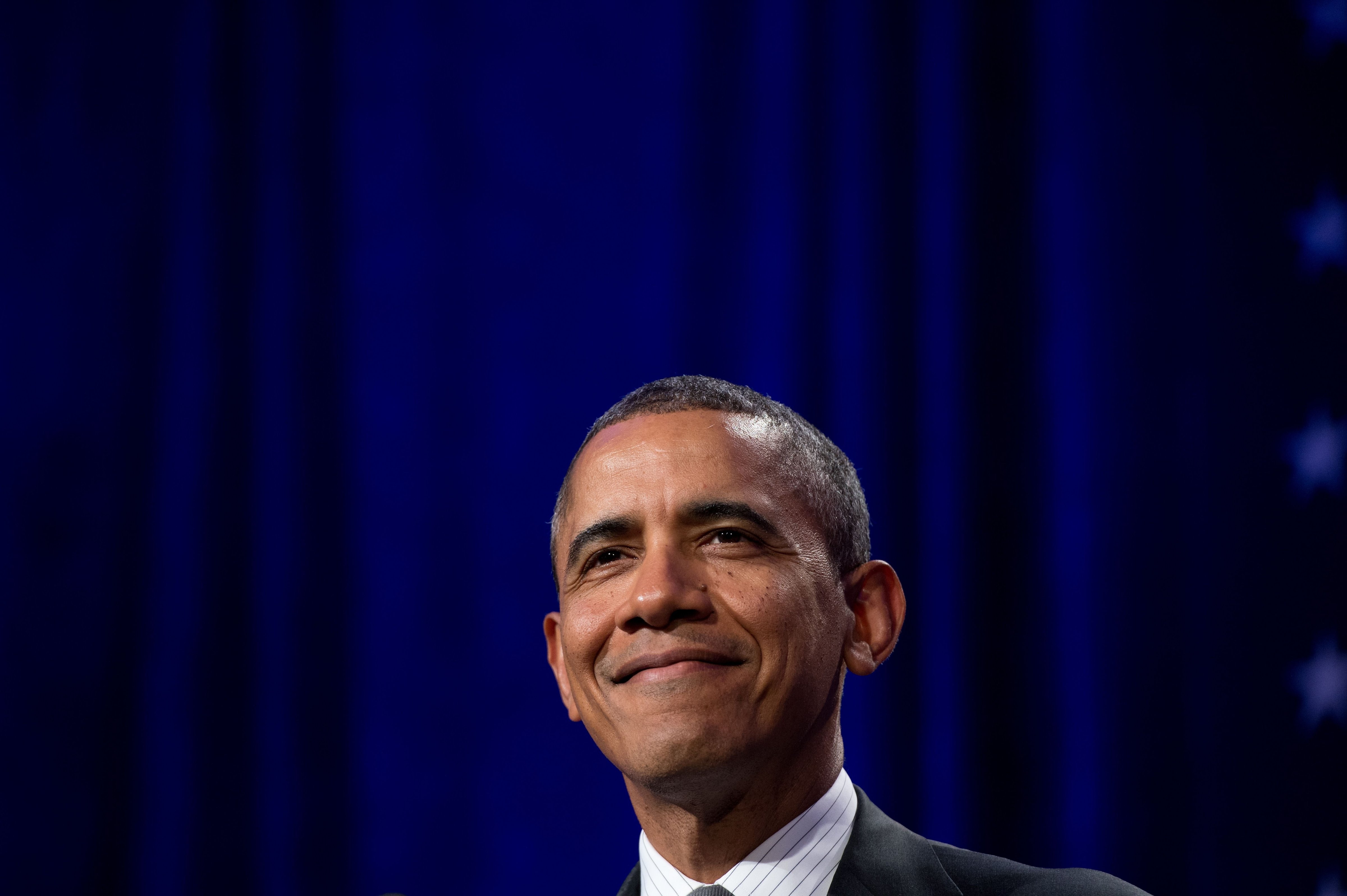 President Barack Obama addresses the National Organizing summit in Washington on February 25, 2014. 