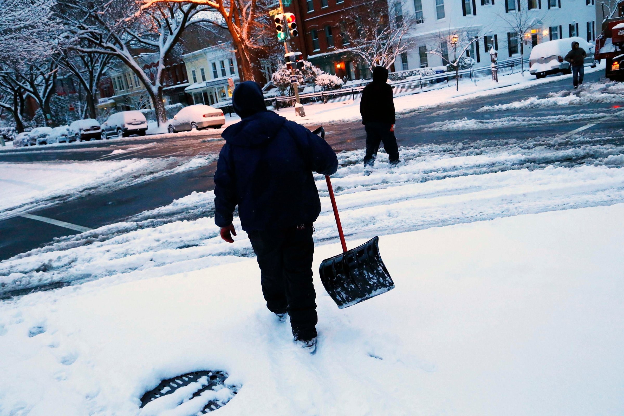 Snow shovelers in the Capitol Hill neighborhood in Washington, D.C., on March 17, 2014.