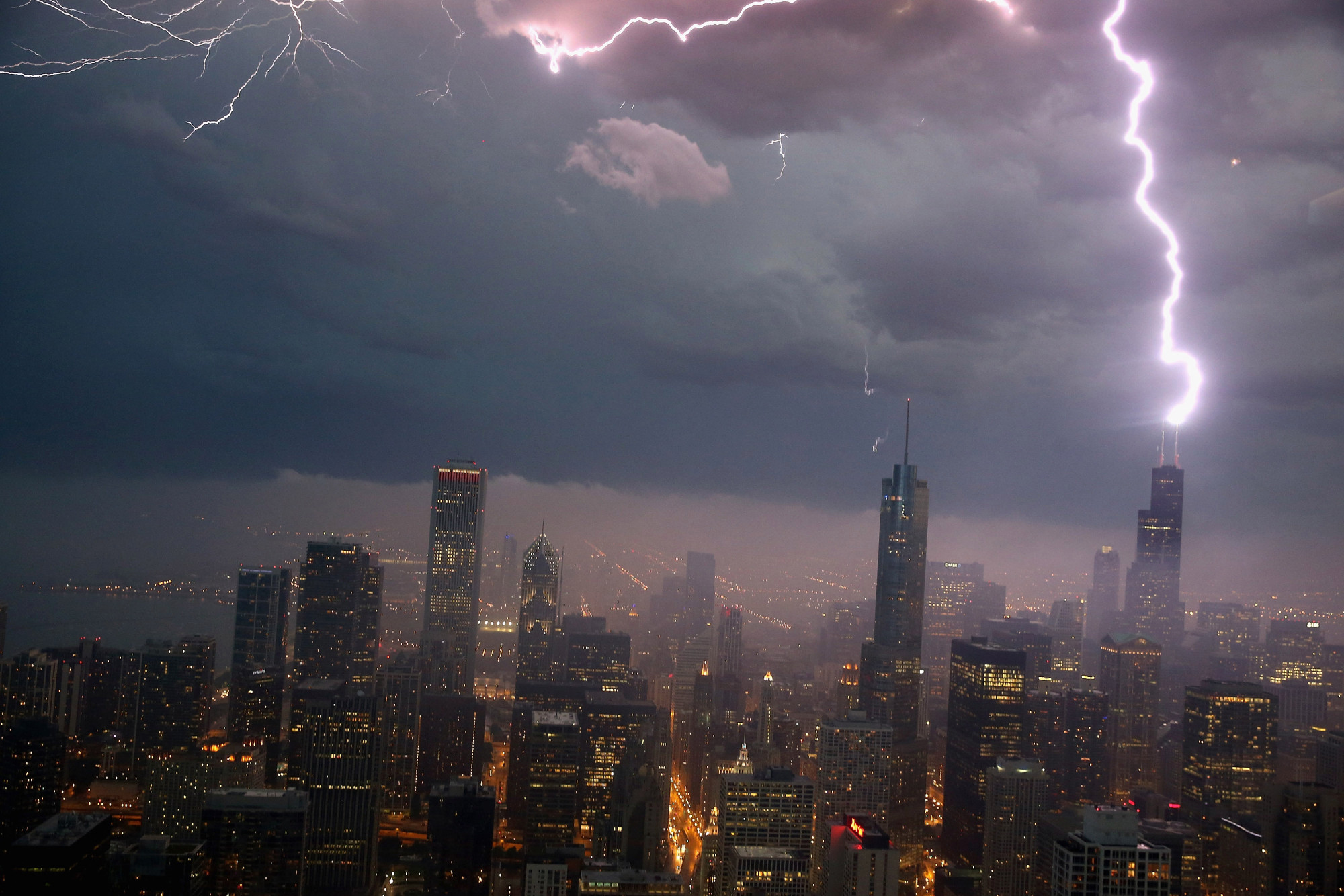 Lightning strikes the Willis Tower, formerly Sears Tower, in downtown on June 12, 2013 in Chicago, Illinois.