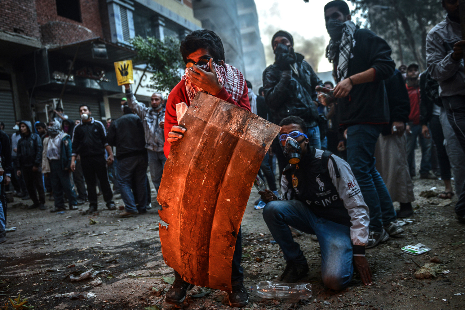 Dec. 27, 2013. Egyptian pro-democracy protestors and police clash during a demonstration against Muslim Brotherhood's 'terrorist label' in the Alf Maskan district of Cairo, Egypt.