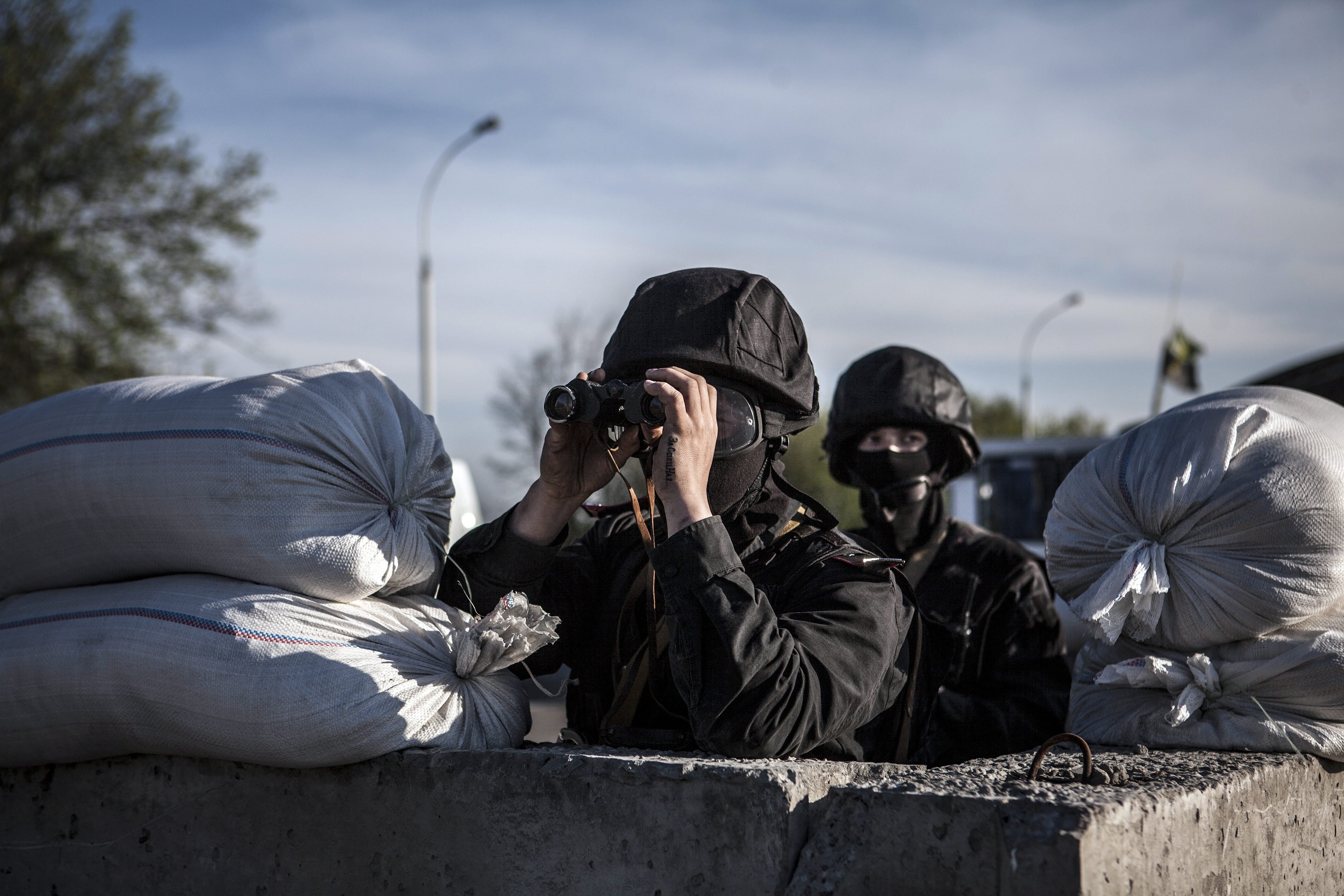 Ukrainian Special forces in position at a checkpoint on the main road between Sloviansk and Donetsk in eastern Ukraine, April 24 2014. (Maysun—EPA)