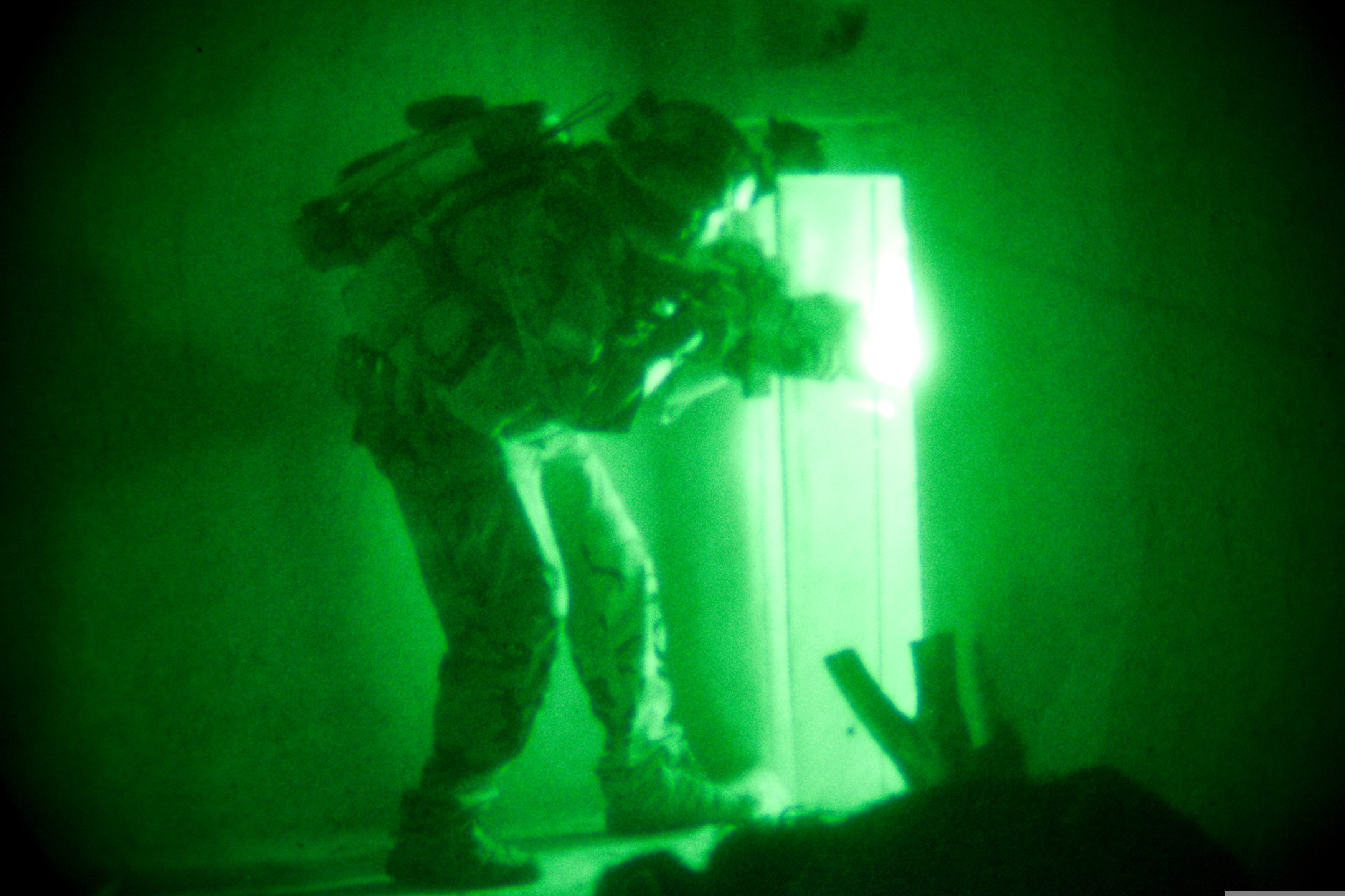 A U.S. Special Forces soldier hunting for Taliban inside a compound in Wardak province, Afghanistan. (Army Photo / Staff Sgt. William Newman)
